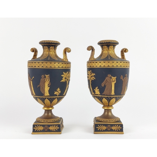 3 - WEDGWOOD BLACK AND GILT BASALT VASES, a pair, 19th century classical Grecian urn form with figurativ... 