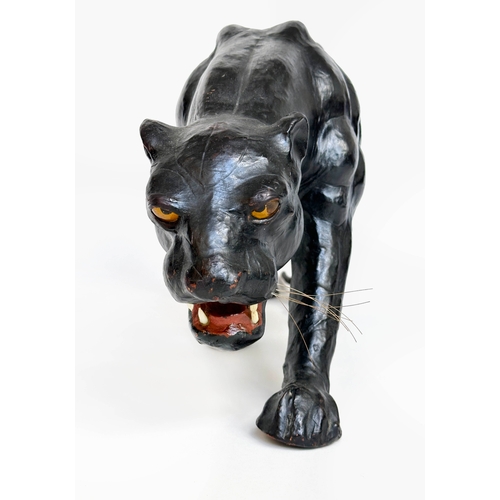 304 - LIBERTY STYLE PANTHER, in the manner of Liberty of London leather covered, 70cm W x 34cm H.