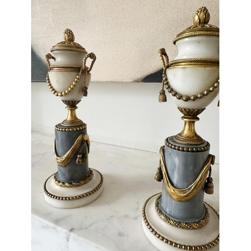 309 - ALABASTER URNS, a pair, 19th century alabaster , marble and ormolu mounted miniature urns on plinths... 