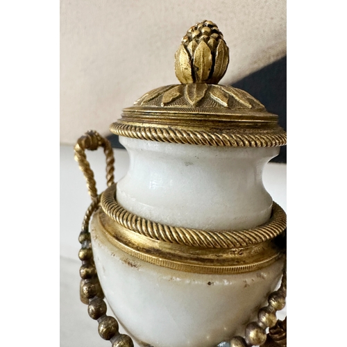 309 - ALABASTER URNS, a pair, 19th century alabaster , marble and ormolu mounted miniature urns on plinths... 