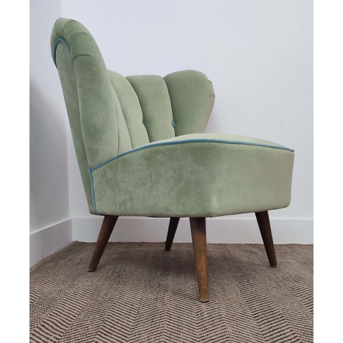 339 - COCKTAIL CHAIR, shell backed with green velvet upholstery, 75cm H x 68cm W x 68cm D.