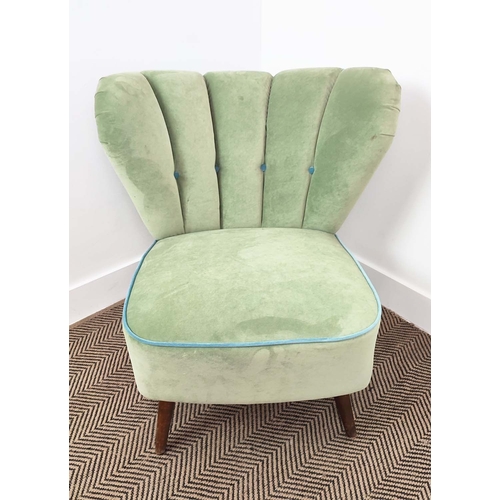 339 - COCKTAIL CHAIR, shell backed with green velvet upholstery, 75cm H x 68cm W x 68cm D.