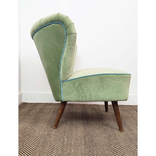 339 - COCKTAIL CHAIR, shell backed with green velvet upholstery, 75cm H x 68cm W x 68cm D.