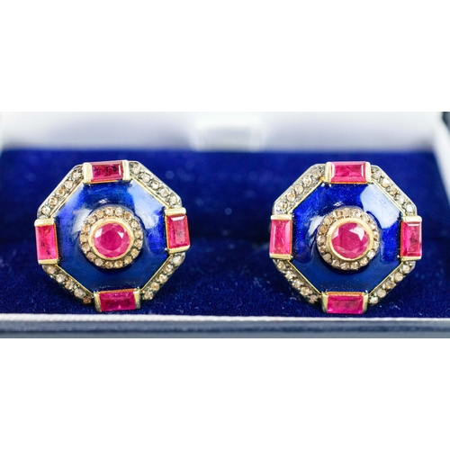 34 - A PAIR OF RUBY AND DIAMOND CUFFLINKS, silver-gilt, each of octagonal form, set with rubies and diamo... 