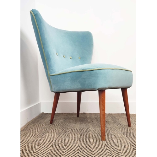 340 - COCKTAIL CHAIR, with blue velvet upholstery, 77cm H x 60cm W x 58cm D.