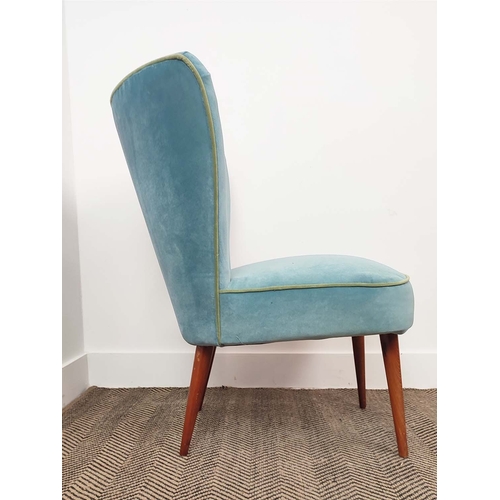 340 - COCKTAIL CHAIR, with blue velvet upholstery, 77cm H x 60cm W x 58cm D.