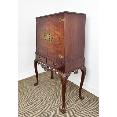 355 - COCKTAIL CABINET, Queen Anne style burr walnut, with cupboard door, over two drawers on a carved sta... 