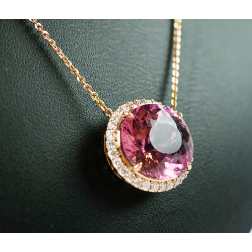 39 - AN 18CT GOLD PINK TOURMALINE PENDANT NECKLACE, the single mixed cut tourmaline of approximately 15.4... 