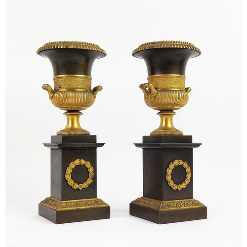 4 - PEDESTAL URNS, a pair, Neo-classical style gilt bronze, 25cm H. (2)