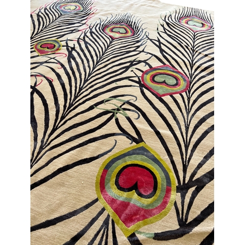 402 - THE RUG COMPANY CARPET, 300cm x 246cm, 'Peacock' designed by Matthew Williamson.