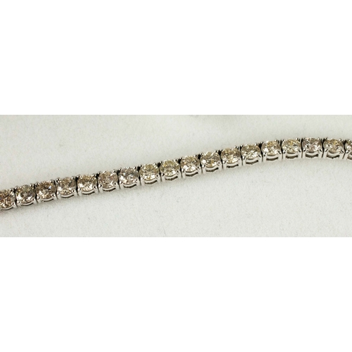 42 - AN 18CT WHITE GOLD DIAMOND SET BRACELET, set with approximately 51 round brilliant cut diamonds, eac... 