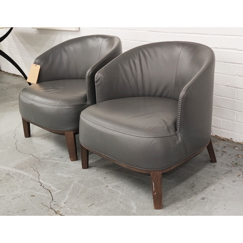 561 - B AND B ITALIA MAXALTO ARMCHAIRS, in stitched grey leather upholstery, 65cm H x 65cm W x 65cm D. (2)