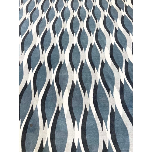 585 - THE RUG COMPANY CARPET, 370cm x 276cm, 'Almond blue' designed by Allegra Hicks.