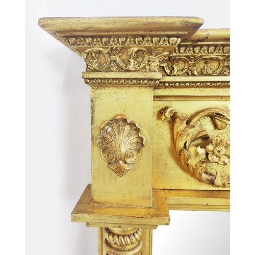 345 - AN EARLY 19TH CENTURY GILTWOOD WALL MIRROR, applied gesso decoration, 116cm H x 75cm W.