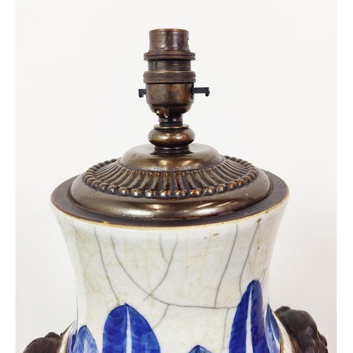 358 - A PAIR OF CHINESE BLUE AND WHITE TABLE LAMPS, hand painted, craquelure bodies, cornered 53cm H. (2)