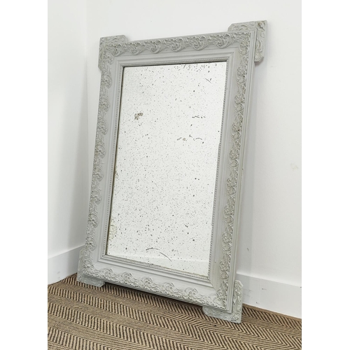 597 - WALL MIRROR, French Louis XVI design, painted frame with a foxed plate, 111cm x 78cm.