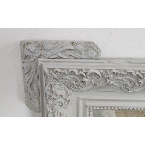 597 - WALL MIRROR, French Louis XVI design, painted frame with a foxed plate, 111cm x 78cm.