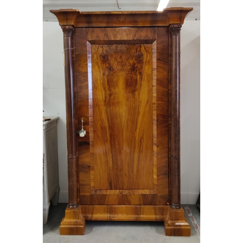 347 - A 19TH CENTURY WALNUT ARMOIRE, the single door flanked by turned columns, 185cm H x 113cm W x 63cm D... 