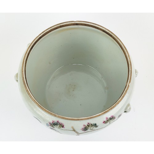 22A - A 20TH CENTURY CHINESE FAMILLE VERTE BASIN, jar with lid and two sancai glazed parrots. (4)