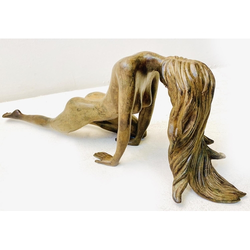 252 - CONTEMPORARY SCHOOL SCULPTURE, of a downward facing female nude, 19cm H x 55cm W x 12cm D.