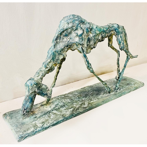 317 - CONTEMPORARY SCHOOL DOG SCULPTURE, in bronze, 30cm H x 60cm L