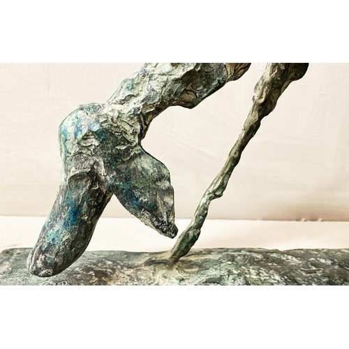 317 - CONTEMPORARY SCHOOL DOG SCULPTURE, in bronze, 30cm H x 60cm L