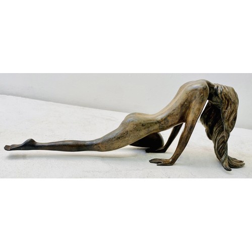 252 - CONTEMPORARY SCHOOL SCULPTURE, of a downward facing female nude, 19cm H x 55cm W x 12cm D.