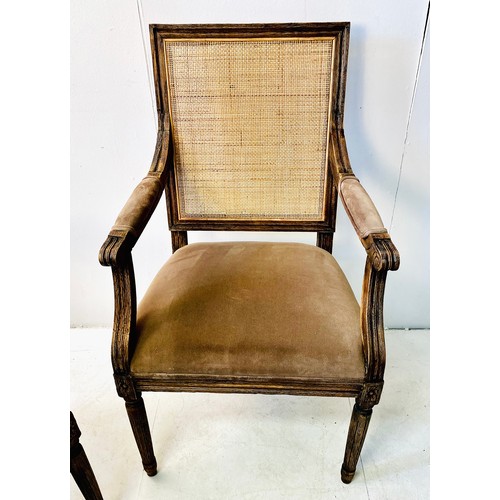 318 - FAUTEUILS, a pair, French oak with rattan backs and brown upholstery, 102cm H x 50cm W x 57cm D. (2)