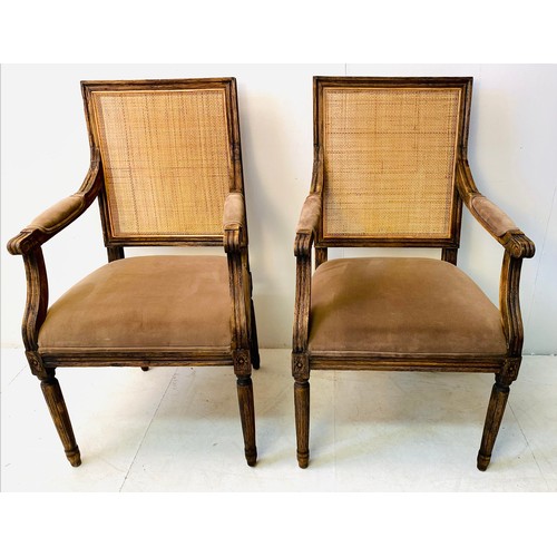 318 - FAUTEUILS, a pair, French oak with rattan backs and brown upholstery, 102cm H x 50cm W x 57cm D. (2)