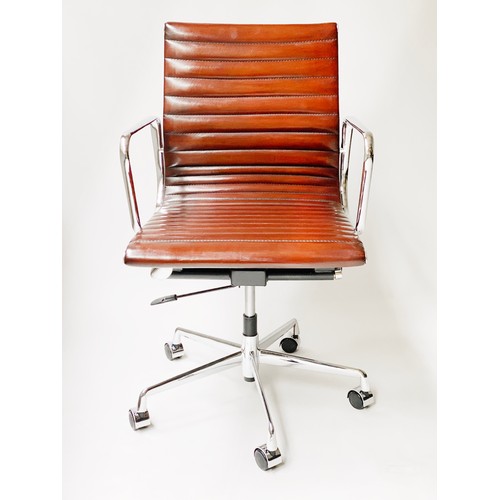 224 - REVOLVING DESK CHAIR, Charles and Ray Eames inspired with ribbed hand finished tan brown leather sea... 