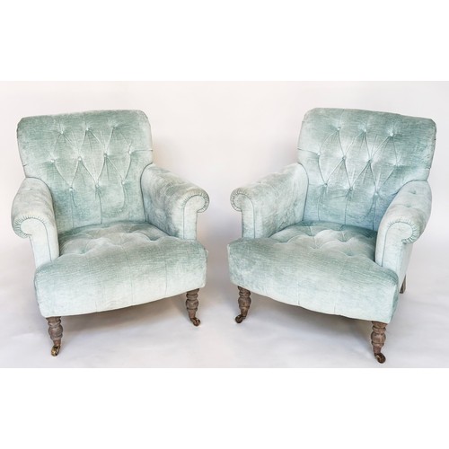 296 - HOWARD STYLE ARMCHAIRS, a pair, with duck egg blue velvet buttoned upholstery, with scroll arms and ... 