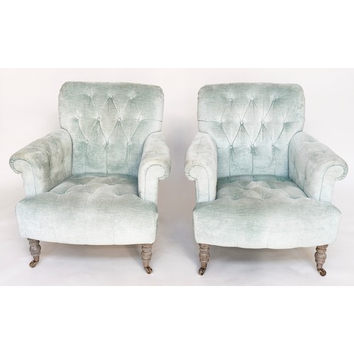 296 - HOWARD STYLE ARMCHAIRS, a pair, with duck egg blue velvet buttoned upholstery, with scroll arms and ... 