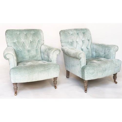 296 - HOWARD STYLE ARMCHAIRS, a pair, with duck egg blue velvet buttoned upholstery, with scroll arms and ... 