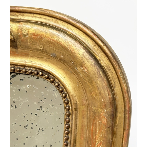 184 - WALL MIRROR, mid 19th century French giltwood and gesso moulded with beaded and incised frame and sh... 