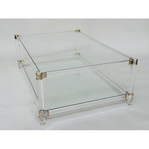 391 - LUCITE LOW TABLE, rectangular with lucite supports and glazed top and undertier, 117cm W x 76cm D x ... 