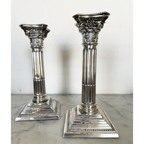 302 - SILVER CANDLESTICKS, a pair, Elizabeth II silver with fluted columns, Corinthian Capitals, detachabl... 