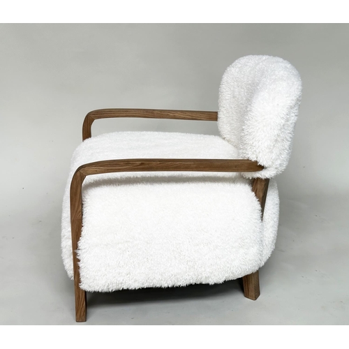 386 - ARMCHAIR, contemporary sheepskin upholstered and teak framed, 62cm W.