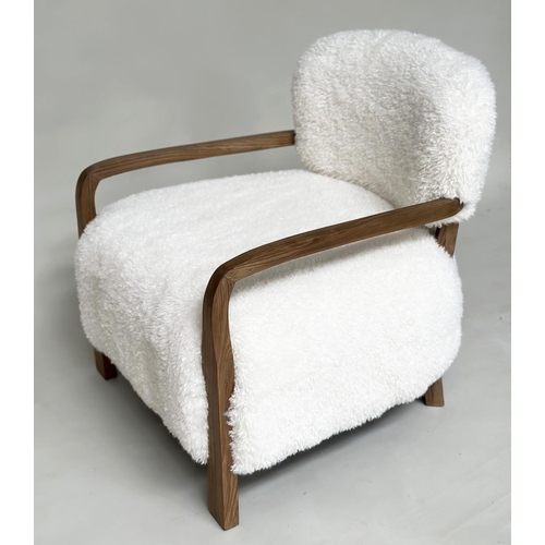 386 - ARMCHAIR, contemporary sheepskin upholstered and teak framed, 62cm W.