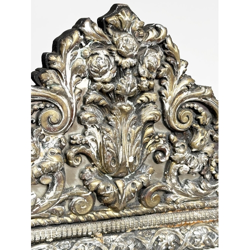 300 - WALL MIRROR, 19th century Dutch repousse silver and ebony rectangular bevelled with marginal plates ... 