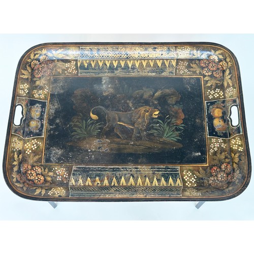 315 - REGENCY TOLEWARE TRAY, Regency gilded and painted rectangular with lion centre landscape on an eboni... 