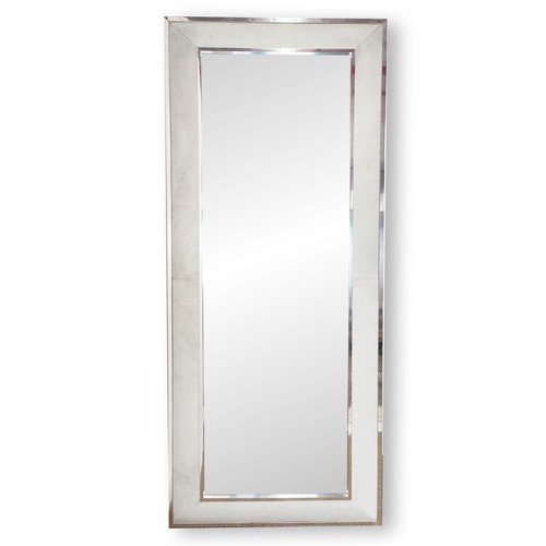 533 - WALL MIRROR, Alcantara upholstered frame, polished metal trim, bevelled plate, 227cm x 100cm.