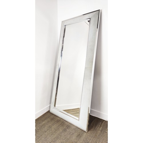 533 - WALL MIRROR, Alcantara upholstered frame, polished metal trim, bevelled plate, 227cm x 100cm.