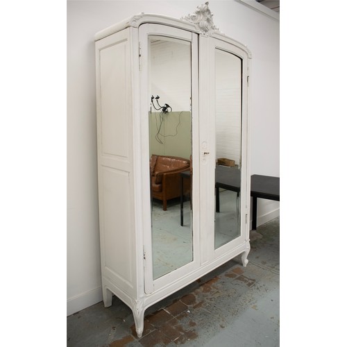 520 - ARMOIRE, circa 1900, French and later white painted with two mirrored doors enclosing two drawers, a... 