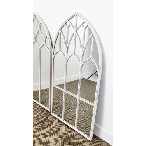 542 - GARDEN WALL MIRRORS, a pair, arched metal frames in white painted finish, 126cm H x 65cm W. (2)