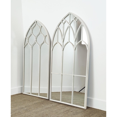 542 - GARDEN WALL MIRRORS, a pair, arched metal frames in white painted finish, 126cm H x 65cm W. (2)