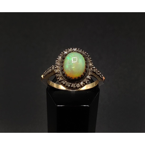 40 - AN OPAL AND DIAMOND DRESS RING, silver gilt and white metal setting, the opal of approximately 1.26 ... 