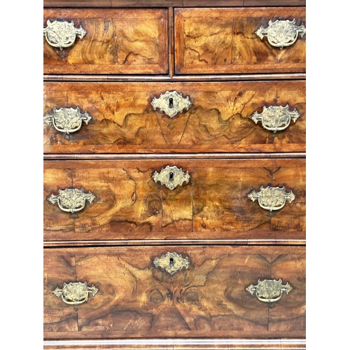 129 - CHEST, early 18th century English Queen Anne figured walnut and crossbanded with two short and three... 