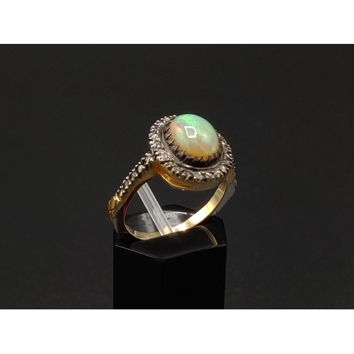 40 - AN OPAL AND DIAMOND DRESS RING, silver gilt and white metal setting, the opal of approximately 1.26 ... 