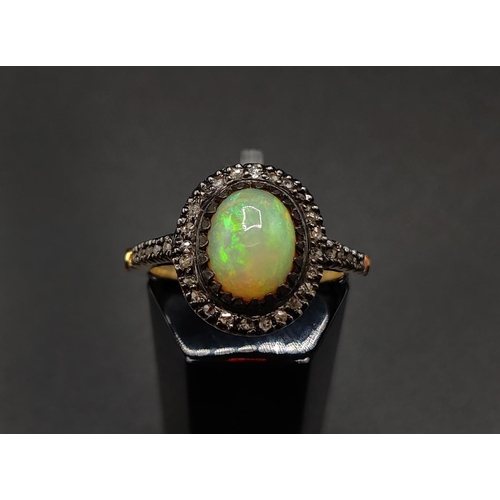 40 - AN OPAL AND DIAMOND DRESS RING, silver gilt and white metal setting, the opal of approximately 1.26 ... 