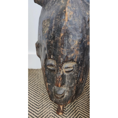 45 - AFRICAN MASK, 'Plank Crest Mask', hand carved wood with central lizard detail and bird finial, 106cm... 